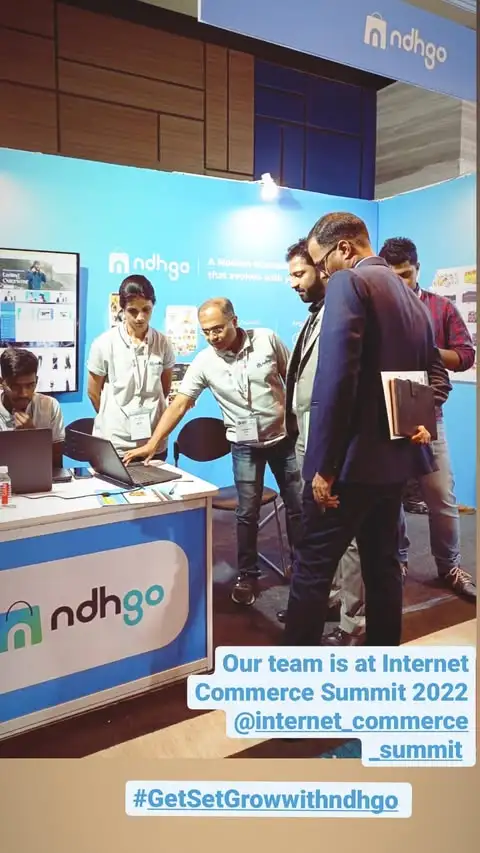 Unizap team members demonstrating the company’s e-commerce solution to visitors at the Internet Commerce Summit 2022.