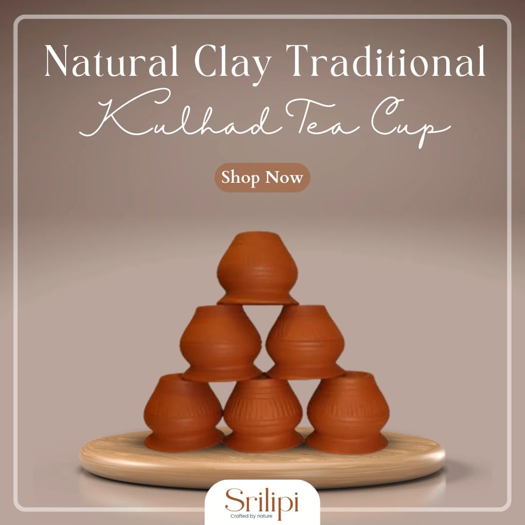 Traditional terracotta kulhad tea cups arranged on a wooden tray